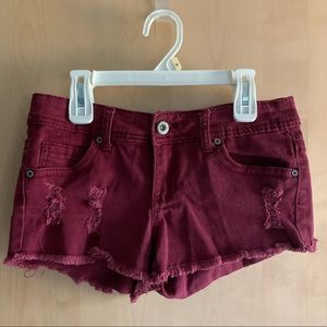 Low rise red denim shorts